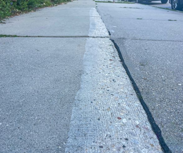 concrete grinding for leveling driveway apron